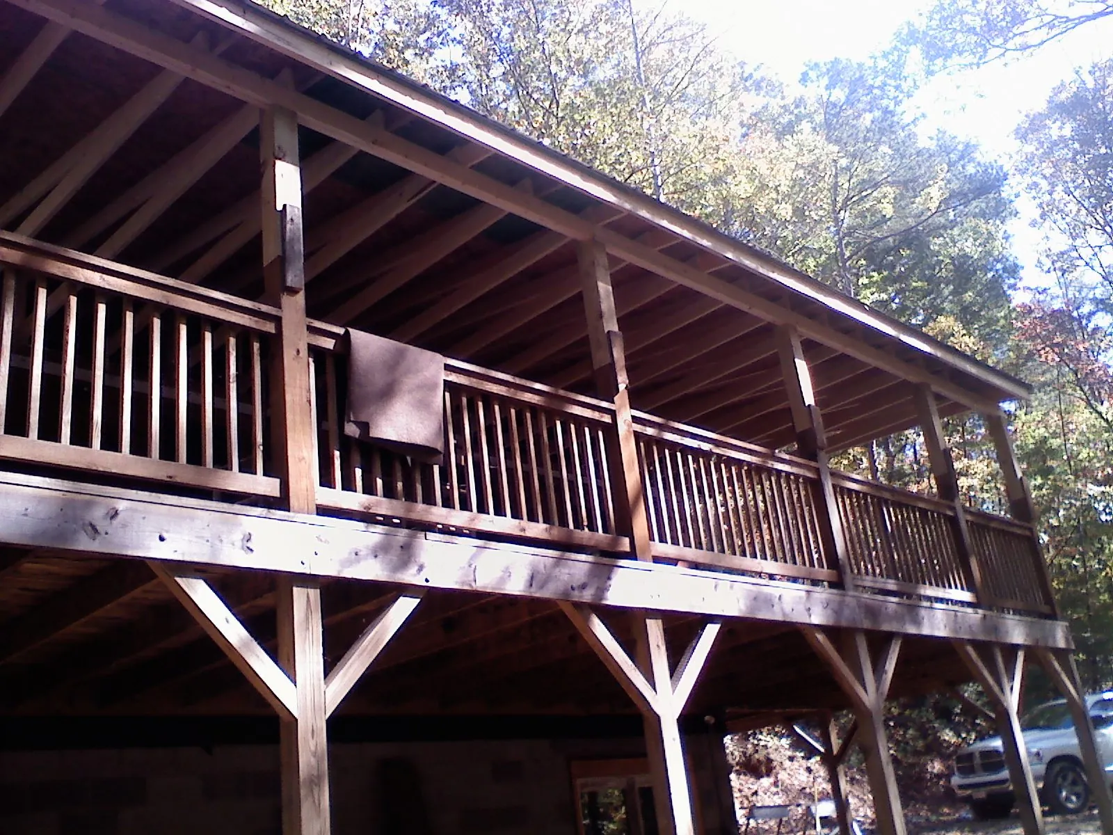 Timber framing under a new elevated porch and deck — Roof Leak Repair in Statesboro by Roofing Brothers